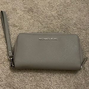 Gray Michael Kors cell phone wallet wristlet